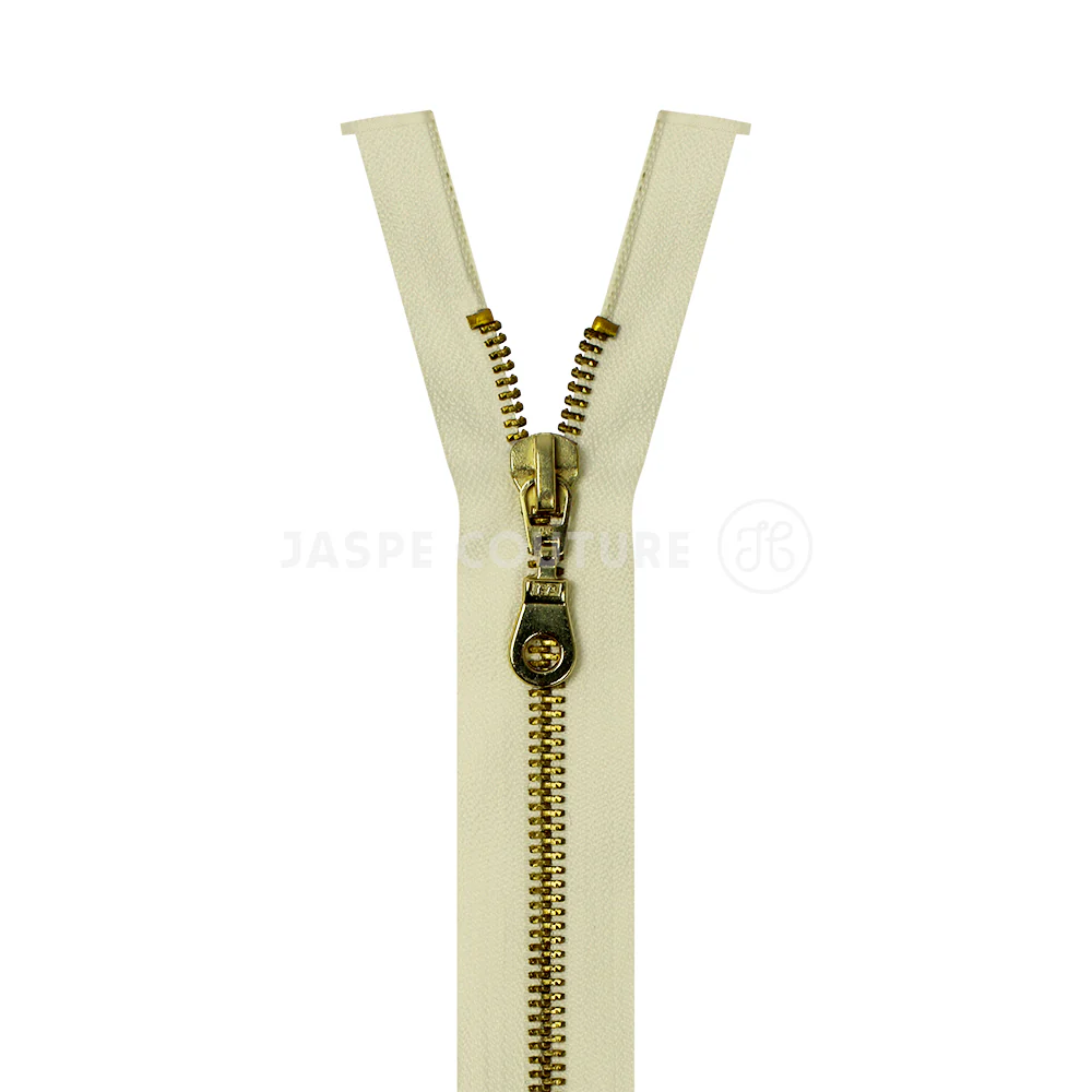 Fermeture éclair séparable métal blanc cassé
